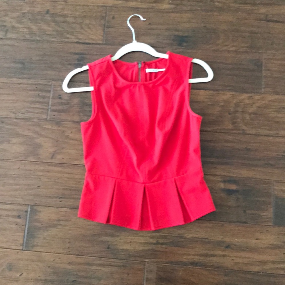 Red sleeveless fitted Peplum blouse